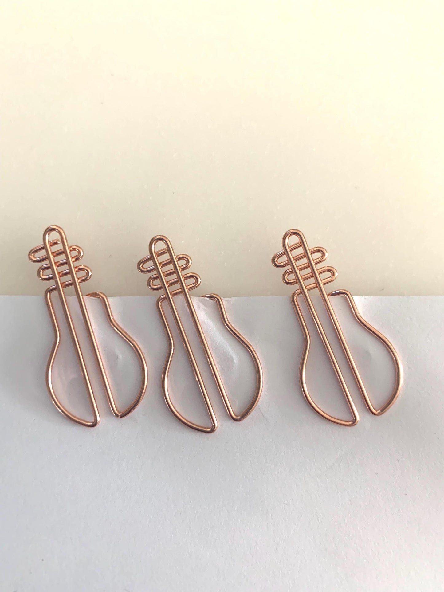 Rose gold lightbulb Paperclips