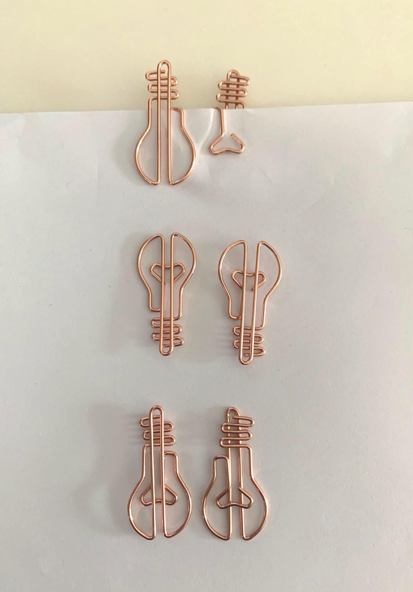 Rose gold lightbulb Paperclips